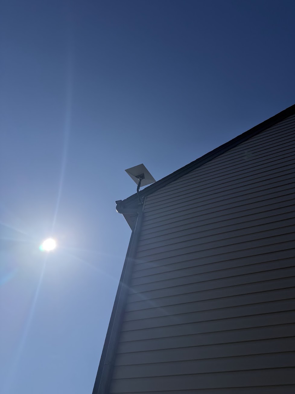 Starlink dish mounted above the roofline with clean exterior cable routing